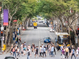 Pedestrians walking through Brisbane CBD